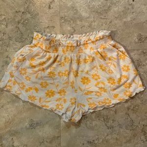 Orange & White floral swim cover shorts.